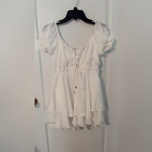 Carolina tie romper white, never worn, size small.